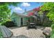 Charming backyard deck offers a perfect spot for outdoor relaxation, featuring a stone and siding exterior at 1748 Sweet Gum Dr, Indianapolis, IN 46260