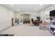Versatile basement area offering flexible space for various activities with access to the upstairs living area at 1748 Sweet Gum Dr, Indianapolis, IN 46260