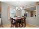 The dining area features natural light and is attached to the kitchen at 1748 Sweet Gum Dr, Indianapolis, IN 46260