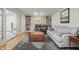 Spacious living room with stone fireplace, built-in shelving, and comfortable seating at 1748 Sweet Gum Dr, Indianapolis, IN 46260