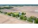An aerial view of residential properties surrounded by farm land at 1891 W 300 N, Anderson, IN 46011