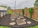 Beautiful garden with raised beds, stepping stones, and a variety of plants and vegetables at 1891 W 300 N, Anderson, IN 46011