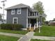 Charming two-story home with well-maintained landscaping and inviting front porch at 203 W 3Rd St, Sheridan, IN 46069
