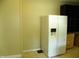 Pantry area featuring white refrigerator and built-in storage at 203 W 3Rd St, Sheridan, IN 46069