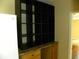 Storage nook with shelving and base cabinets at 203 W 3Rd St, Sheridan, IN 46069
