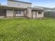 Large backyard featuring a shed and a pergola over a brick patio at 2035 Theodore Dr, Indianapolis, IN 46214