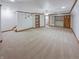 Large finished basement features new carpeting, neutral walls, and ample space for recreation at 2035 Theodore Dr, Indianapolis, IN 46214