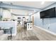 Bright, open kitchen featuring white cabinetry, stainless steel appliances, and a stylish island at 2209 W 9Th St, Muncie, IN 47302