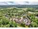 Community aerial view with green trees and a highway off in the distance at 2267 Rome Dr # A, Indianapolis, IN 46228