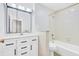 Bathroom featuring modern vanity with sink and updated shower and tub at 2267 Rome Dr # A, Indianapolis, IN 46228