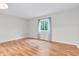 Bedroom featuring hardwood floors and a bright window at 2267 Rome Dr # A, Indianapolis, IN 46228