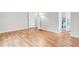 Bedroom with hardwood flooring and view into ensuite bathroom at 2267 Rome Dr # A, Indianapolis, IN 46228