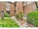 Charming brick building with well-manicured landscaping and inviting walkways at 2267 Rome Dr # A, Indianapolis, IN 46228