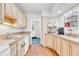 Efficient kitchen featuring cabinets, appliances, and easy access to other areas at 2267 Rome Dr # A, Indianapolis, IN 46228