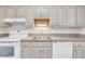 A kitchen sink and cabinets that offer storage options in a functional layout at 2267 Rome Dr # A, Indianapolis, IN 46228
