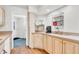 Practical kitchen with wood cabinetry, providing ample storage and counter space at 2267 Rome Dr # A, Indianapolis, IN 46228