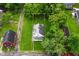 Aerial view of a house with a big yard surrounded by mature trees and marked with yellow property lines at 2622 Ethel Ave, Indianapolis, IN 46208
