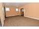 Bright living room featuring neutral colored walls and carpet flooring at 2622 Ethel Ave, Indianapolis, IN 46208