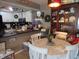 Eat-in kitchen featuring white cabinetry, a breakfast bar, and charming decor at 2931 Eagles Crest Cir, Indianapolis, IN 46214