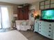 Charming living room with a comfortable white chair and rustic decor elements at 2931 Eagles Crest Cir, Indianapolis, IN 46214