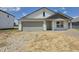 Charming single-Gathering home featuring a two-car garage and inviting covered front porch at 3292 W Longbranch Dr, Monrovia, IN 46157