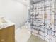 Cozy bathroom featuring a daisy shower curtain, providing a comfortable space at 3387 S County Road 250 W, Danville, IN 46122