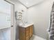 Bright bathroom with modern vanity, decorative towels, and a door leading to bedroom at 3387 S County Road 250 W, Danville, IN 46122