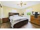 Cozy bedroom with a large window and a wooden dresser at 3387 S County Road 250 W, Danville, IN 46122