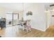 Well-lit dining area with hardwood floors and sliding doors leading to the outdoors, perfect for entertaining at 3387 S County Road 250 W, Danville, IN 46122