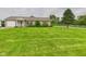 Ranch-style home boasting a well-manicured lawn, inviting curb appeal, and a one-car garage at 3387 S County Road 250 W, Danville, IN 46122