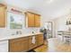 Kitchen features wood cabinets, stainless steel appliances, and ample counter space at 3387 S County Road 250 W, Danville, IN 46122