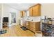 Functional kitchen with modern cabinetry, white countertops, and hardwood floors, blending style with practicality at 3387 S County Road 250 W, Danville, IN 46122