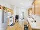 Well-equipped kitchen with stainless steel appliances, plenty of cabinet space, and hardwood floors, ready for cooking at 3387 S County Road 250 W, Danville, IN 46122