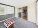 Bright sunroom with multiple windows that opens into the dining room at 3387 S County Road 250 W, Danville, IN 46122