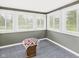 Bright sunroom with multiple windows and neutral carpet at 3387 S County Road 250 W, Danville, IN 46122