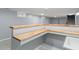 Entertaining wet bar featuring wood countertop and sleek sink at 3735 Marrison Pl, Indianapolis, IN 46205