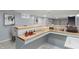 Entertaining wet bar featuring wood countertop, seating, and appliances at 3735 Marrison Pl, Indianapolis, IN 46205