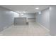Finished basement offers great additional space and neutral color palette at 3735 Marrison Pl, Indianapolis, IN 46205
