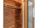 Walk-in closet featuring cedar wood paneling and wooden clothing rack at 3735 Marrison Pl, Indianapolis, IN 46205