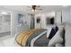 Relax in this Primary bedroom featuring a plush bed, built-in closet, and ensuite bath at 3735 Marrison Pl, Indianapolis, IN 46205
