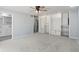 Primary bedroom features carpet, ceiling fan, en suite bath, walk-in closet with organization and a linen closet at 3735 Marrison Pl, Indianapolis, IN 46205