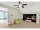 Attic with carpeted floors, built-in storage shelves, lots of light, and comfortable play area for or guests at 4123 S Village Row, New Palestine, IN 46163