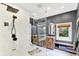 This gorgeous bathroom has a glass shower and beautiful vanity at 4123 S Village Row, New Palestine, IN 46163