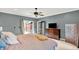 The spacious bedroom has a ceiling fan, and access to the backyard at 4123 S Village Row, New Palestine, IN 46163