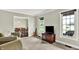Cozy living room with a television and large windows at 4123 S Village Row, New Palestine, IN 46163