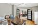 Bright office featuring beautiful hardwood floors, natural light, and French doors at 4123 S Village Row, New Palestine, IN 46163