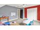 Bright playroom featuring a whiteboard, great natural light, and storage space at 4123 S Village Row, New Palestine, IN 46163
