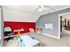 Large playroom with bright natural light and plenty of space at 4123 S Village Row, New Palestine, IN 46163