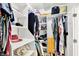 This spacious walk-in closet has shelves and hanging racks at 4123 S Village Row, New Palestine, IN 46163