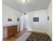 Simple bedroom with wood floors, a dresser, and playful wall decor at 4125 Bowman Ave, Indianapolis, IN 46227